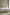 Bathroom with walls, bathtub and panelling painted in various shades of Rolling Fog, a collection of neutral brown paints.
